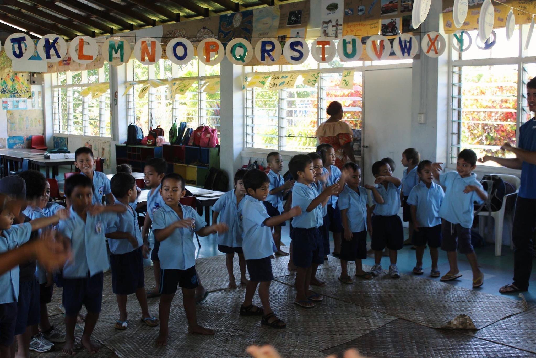 Projects Abroad volunteers in Samoa host a lesson at a local pre-school A group of school children at a care placement in Samoa